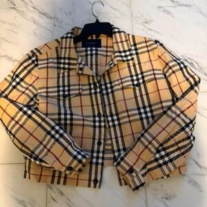 Burberry womens Jacket Sz XL, in a good condition